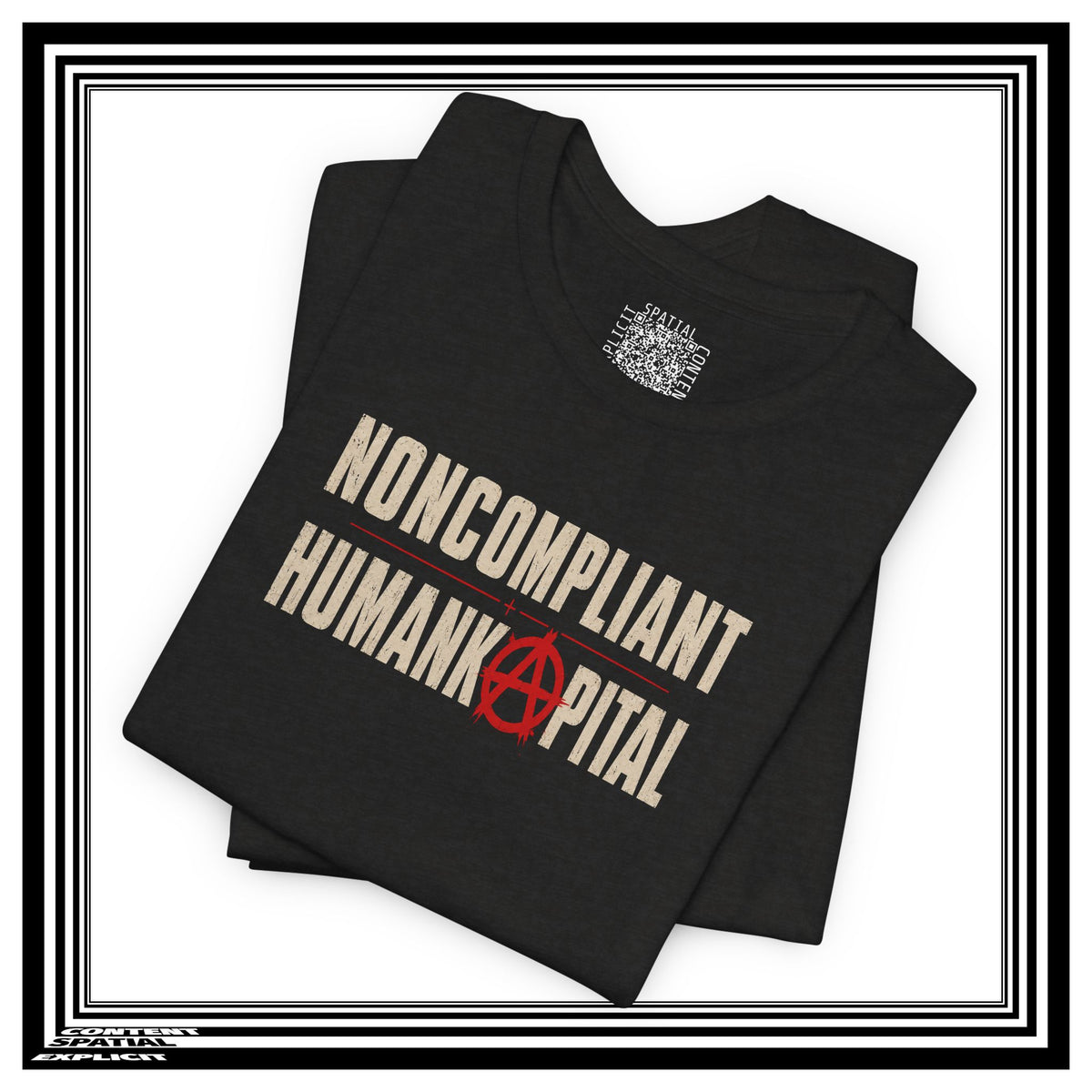 A folded black t-shirt with a graphic print reading 'NONCOMPLIANT HUMAN CAPITAL' in beige, separated by a red horizontal line, with a red anarchy symbol over the letter 'A'. The shirt is displayed on a white background with a black and white double border frame.