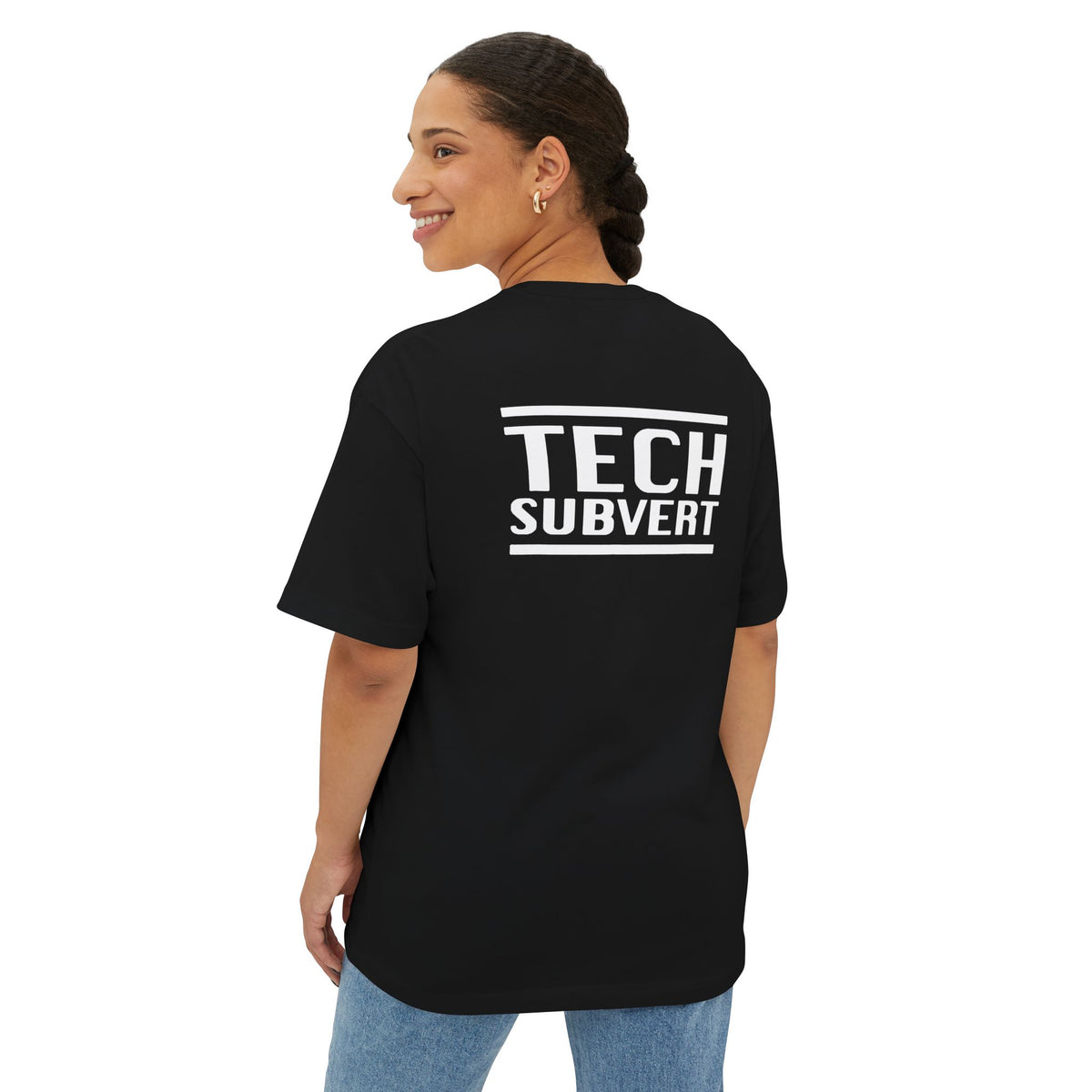 Person wearing a black t-shirt with 'TECH SUBVERT' text on the back, standing against a white background.